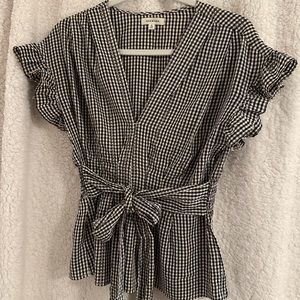 Polyester/rayon blend pullover top.